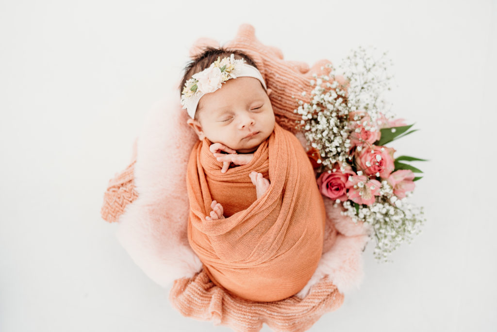 sleeping posed baby at in-studio lifestyle newborn shoot